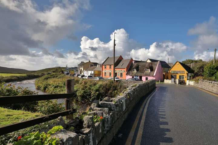a train is parked on the side of a road